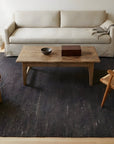Charcoal Brown Artistic Flatweave Wool Rug in a living room