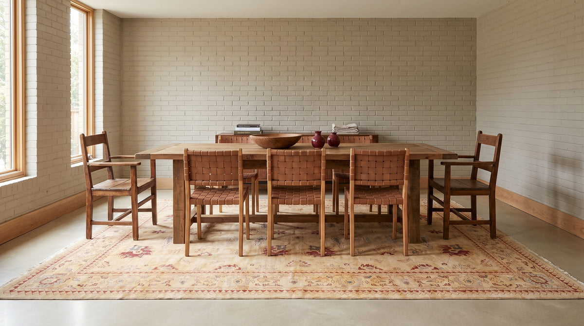 Elegant Beige Hand Knotted Wool Rug in a dining room