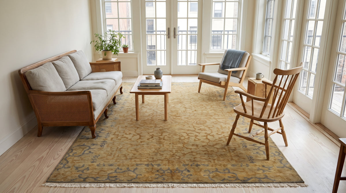 Warm Bianca Gold Hand Knotted Wool Rug in a sunroom