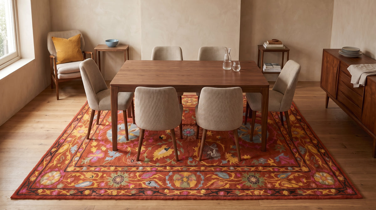 Willow Rust Hand Tufted Wool Rug in a dining room