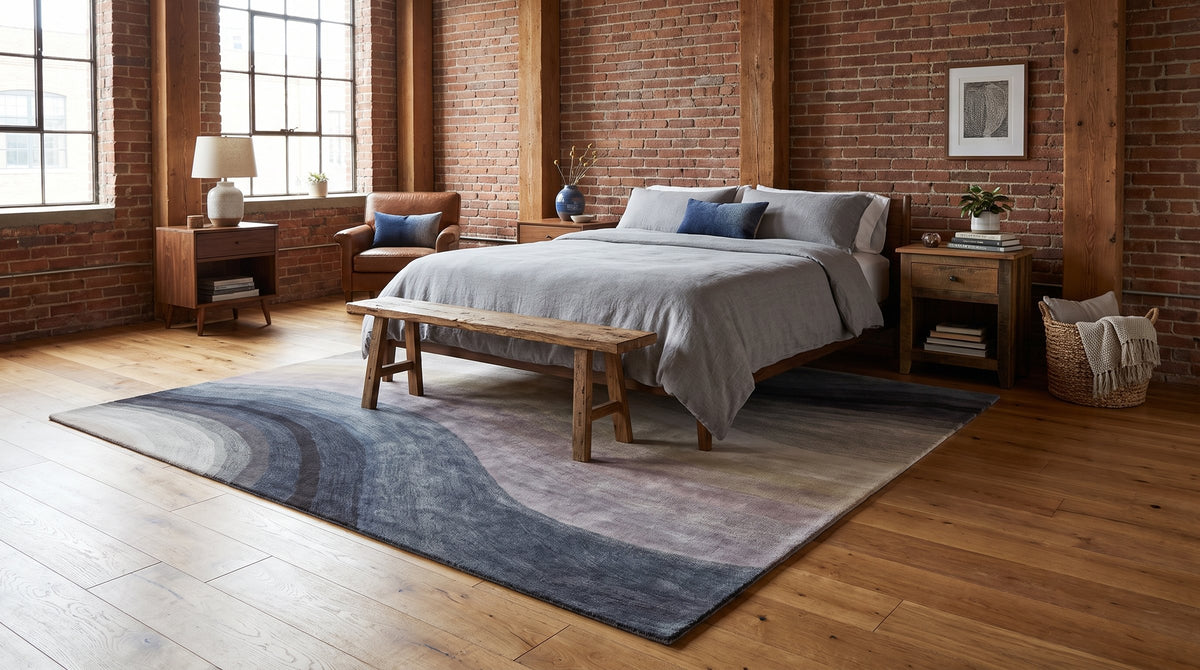 Xena Blue and Gray Hand Tufted Wool Rug in a bedroom