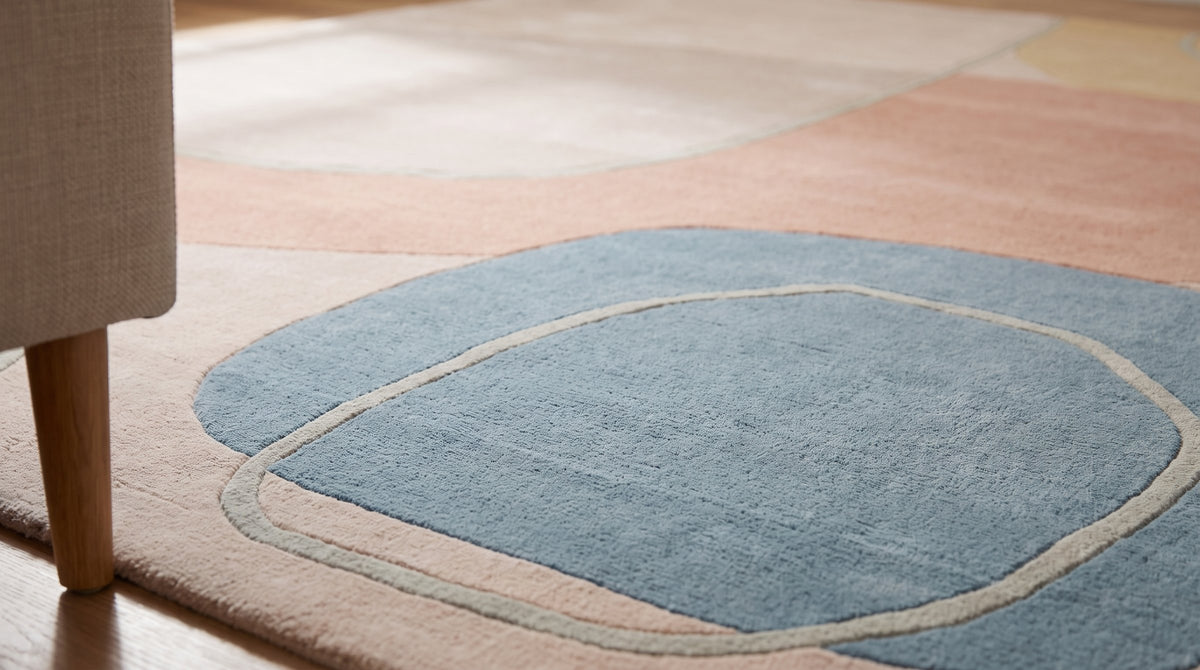 Yara Laine Multicolor Hand Tufted Wool Rug in a bedroom