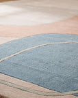 Yara Laine Multicolor Hand Tufted Wool Rug in a bedroom