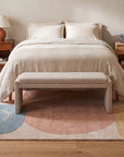 Yara Laine Multicolor Hand Tufted Wool Rug in a bedroom