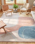 Yara Laine Multicolor Hand Tufted Wool Rug in a sunroom