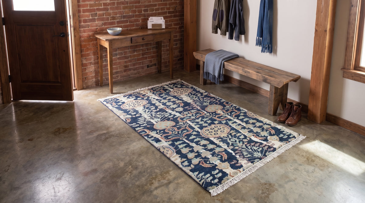 Zinnia Louie Blue Hand Knotted Wool Rug in a entryway