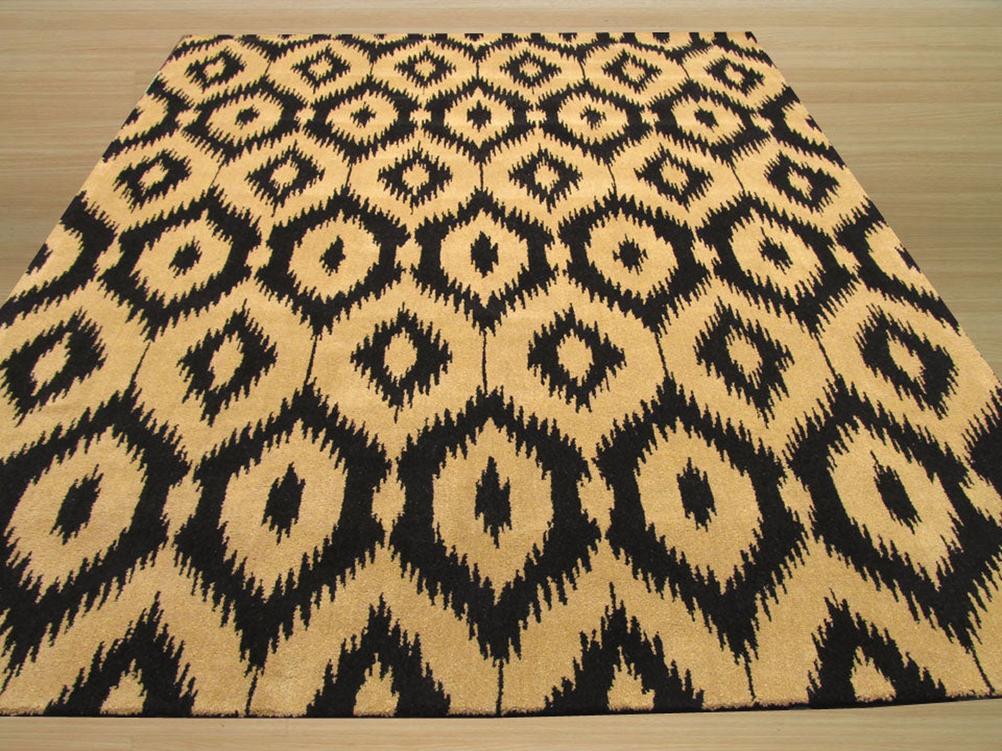 Golden Ikat Hand-Tufted Black Wool Rug